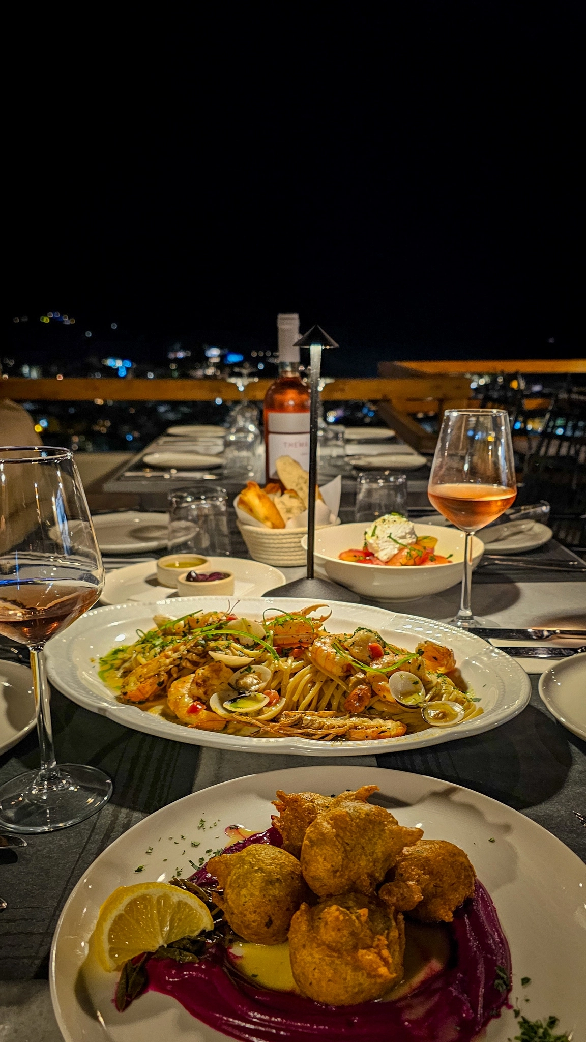 Welcome to Akre, located atop Skiathos. Join our table, with panoramic view of the island. Experience elevated Greek & Mediterranean cuisine against a stunning panoramic backdrop of Skiathos.